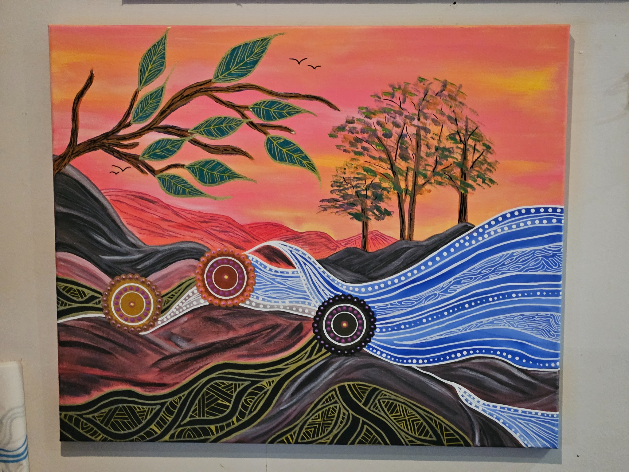 Painted Country landscape with waterways, trees and circular gathering motifs